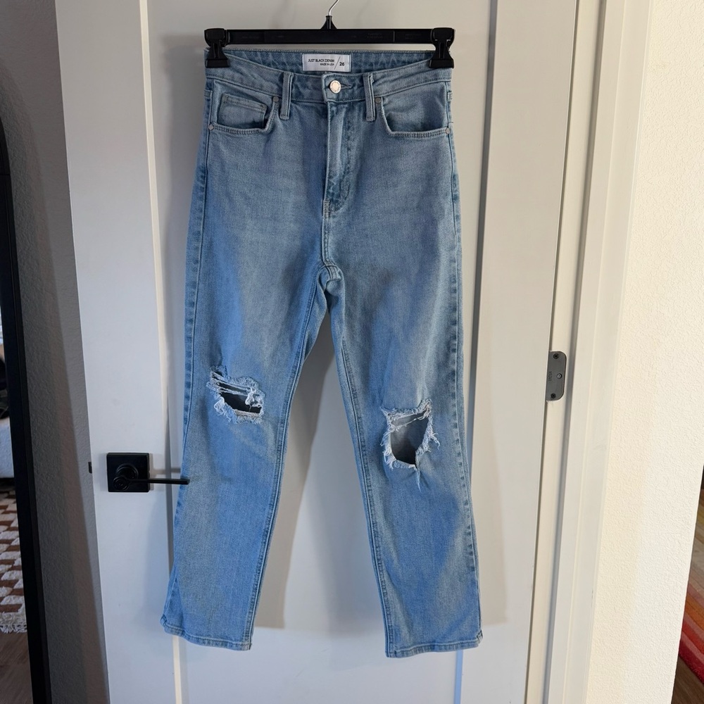 Distressed blue jeans